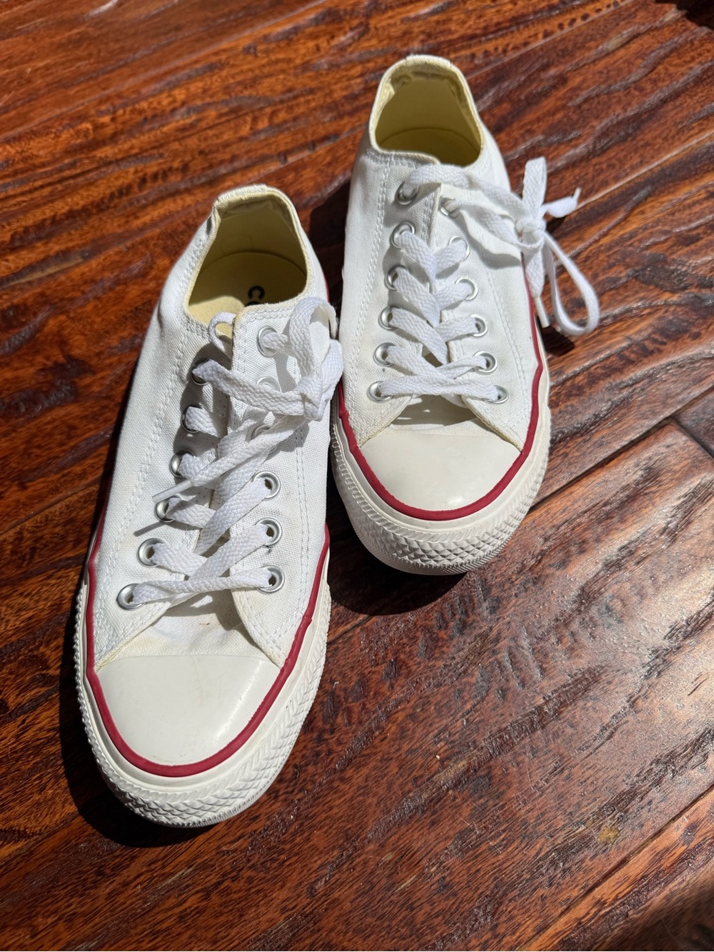 Converse Women’s White Canvas Sneakers with Red Trim
